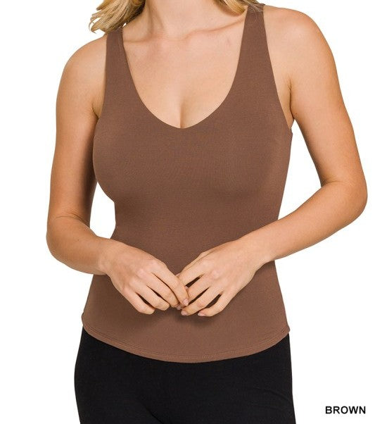 Brown tank top worn by a person on a white background