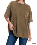 Brown acid wash oversized t-shirt worn by a person on a white background