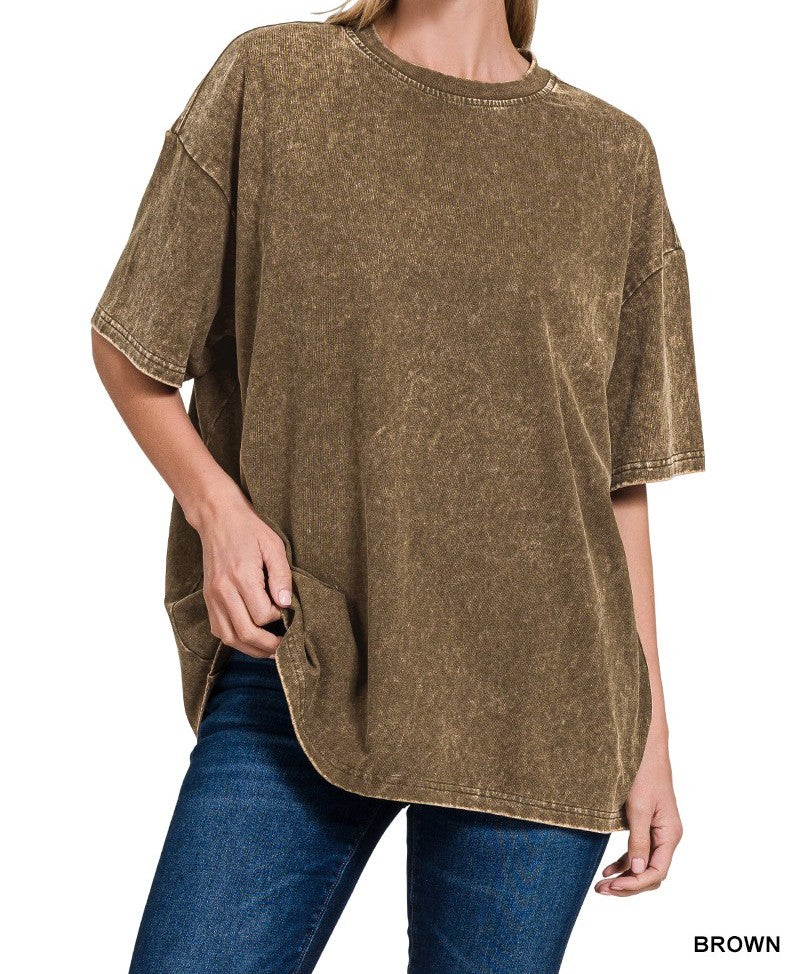 Brown acid wash oversized t-shirt worn by a person on a white background